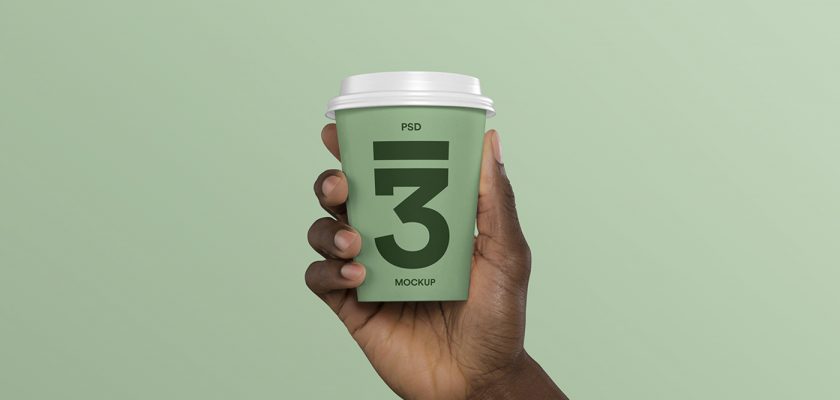 Hand Holding Coffee Cup Mockup - Free Mockup Download