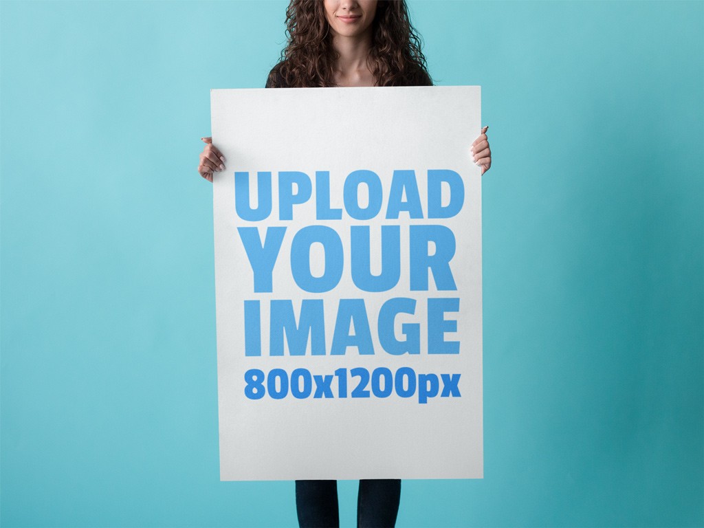 Boost your advertising campaign with this eye-catching poster mockup. This poster mockup features a young woman holding the poster with both hands in a vertical position. The background of this photo is a turquoise wall, which makes your projects stand out compellingly.