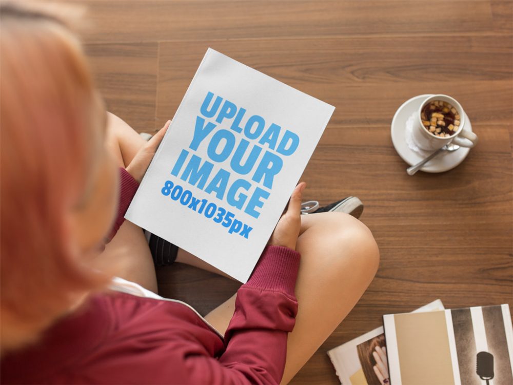 Woman Holding a Book Mockup Generator