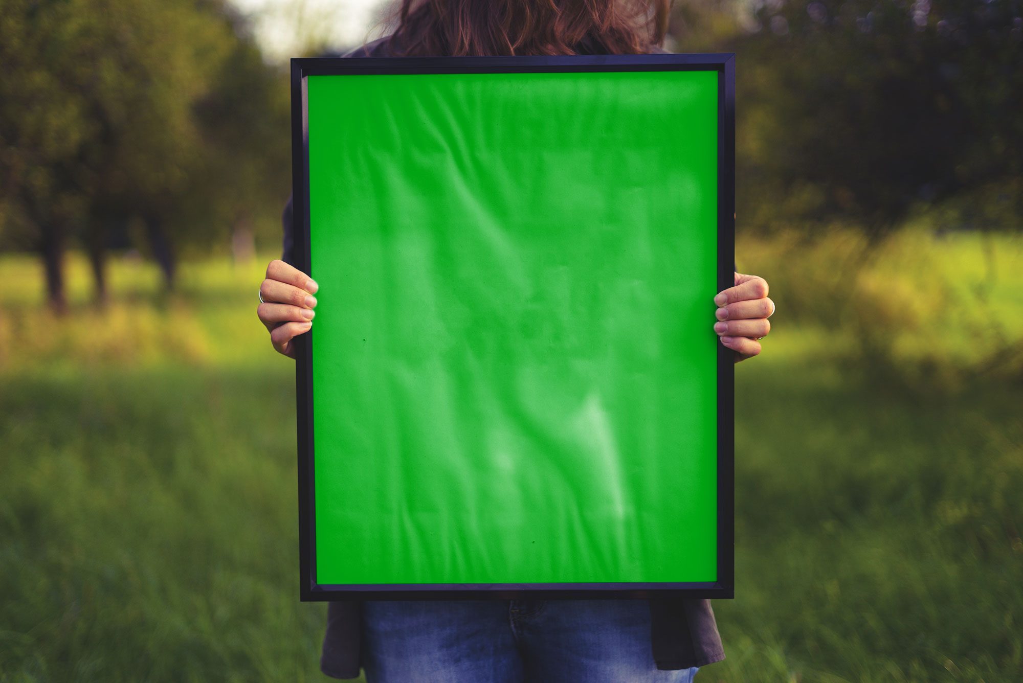 Woman Holding Art Poster Free Mockup