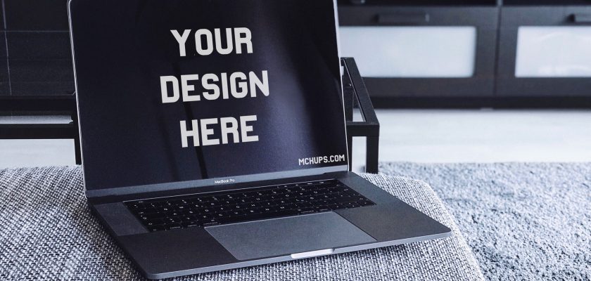 Free MacBook Pro Mockup on a Couch