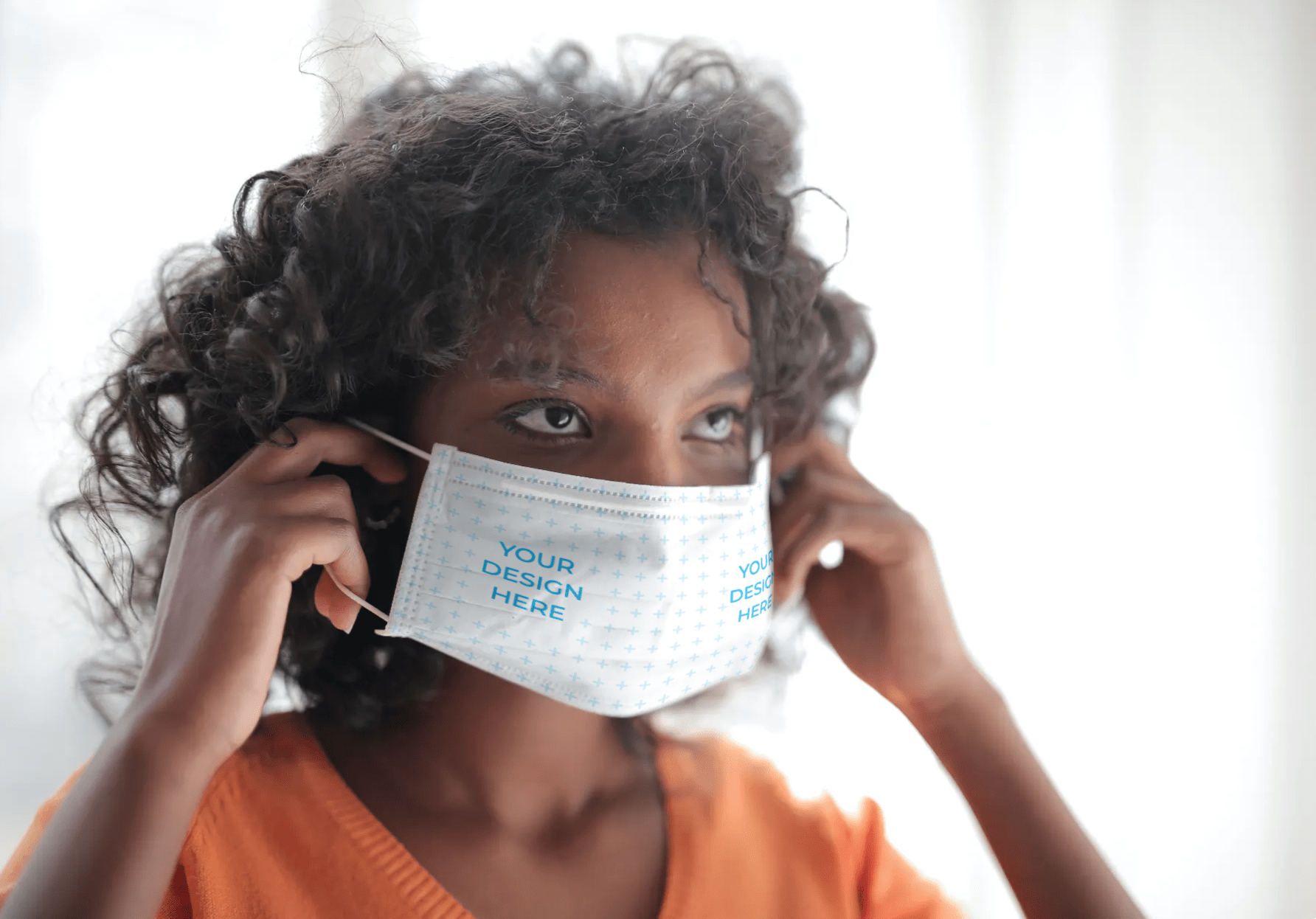 African-American Woman Wearing a Face Mask Free Mockup Generator