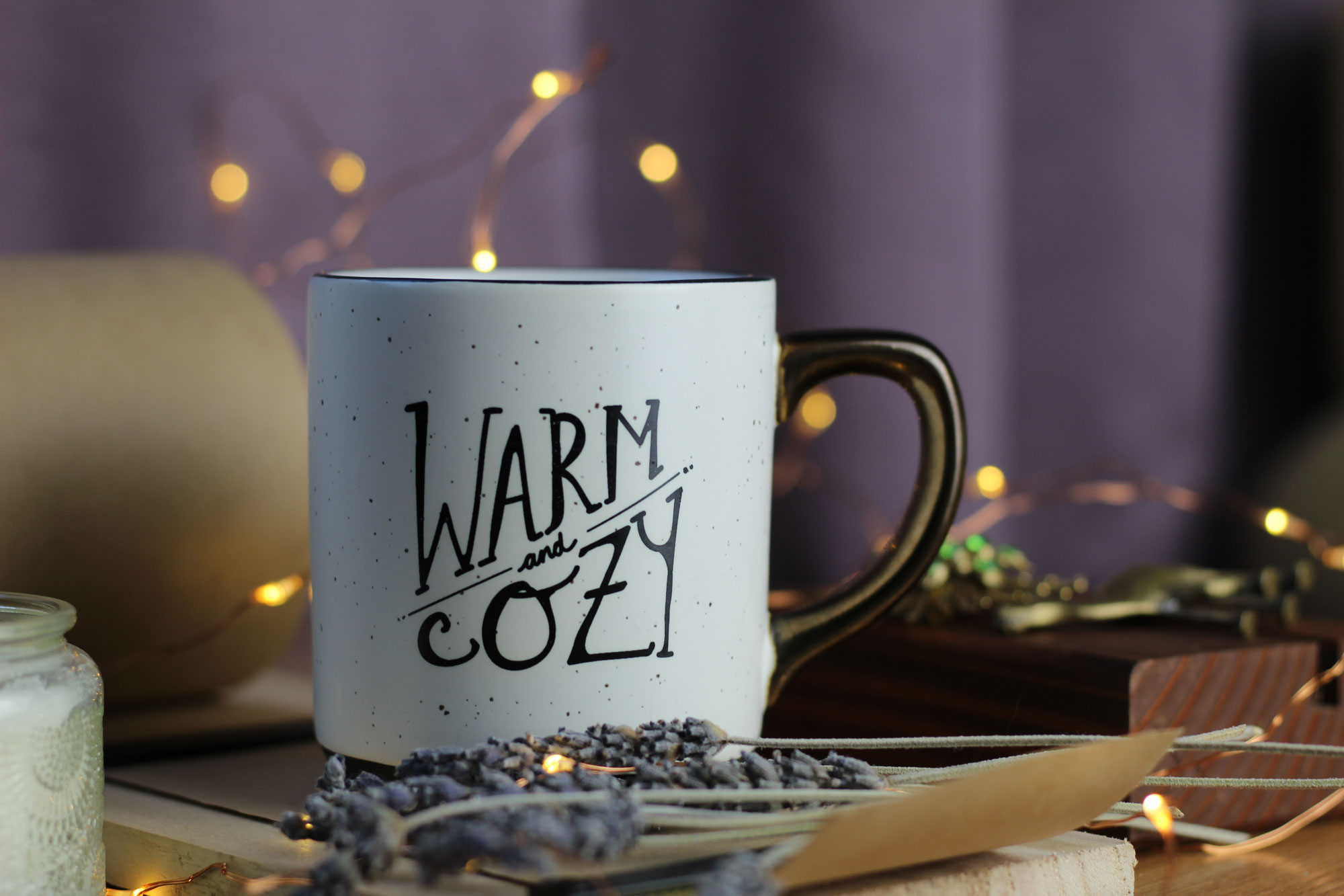 Mug With Hot Tea Standing On A Chair With Woolen Blanket In A Cozy