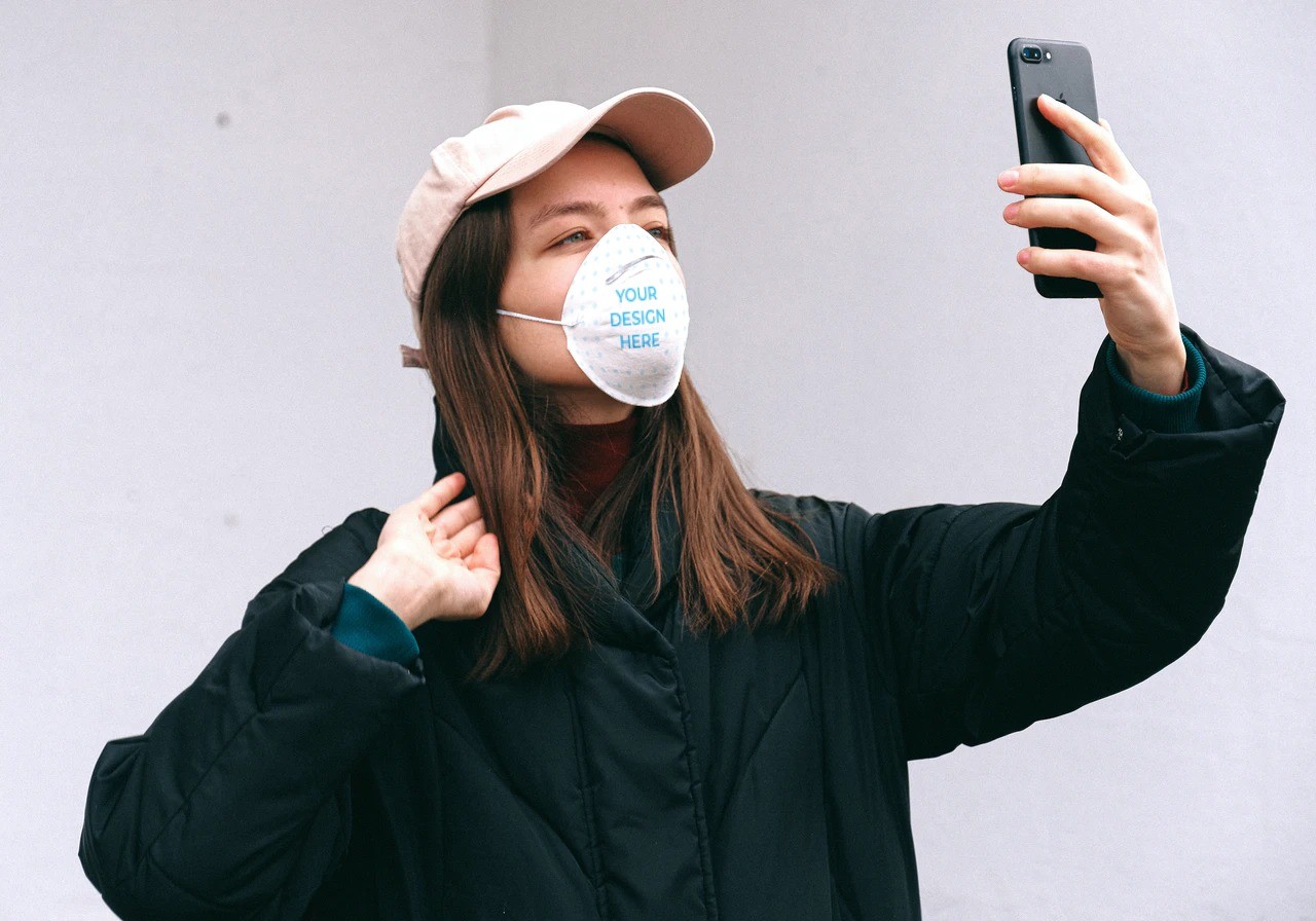 Download Woman Wearing a Face Mask Outdoors - Free Mockup Download