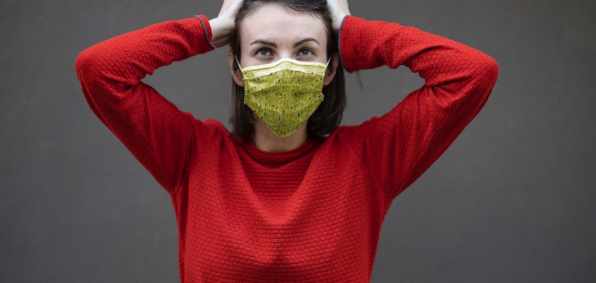 Mask Mockup With Young Woman in Red Sweater