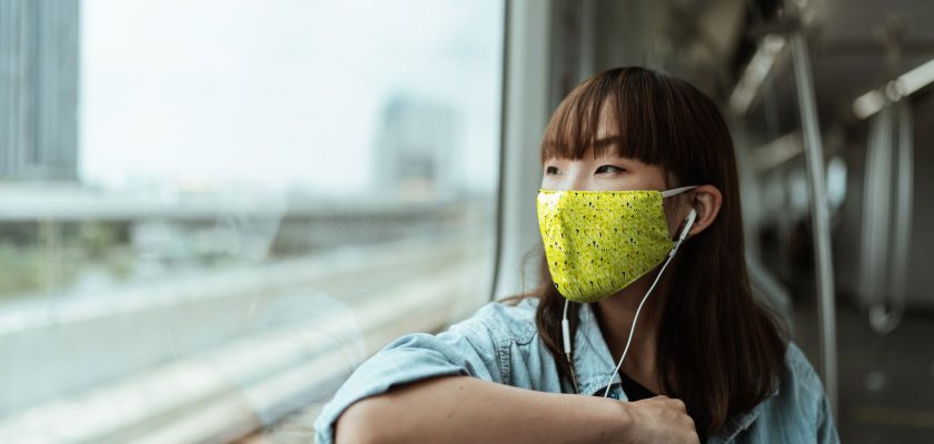 mask mockup woman in train wearing face mask