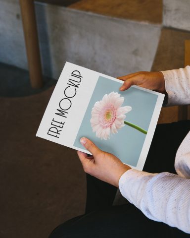 Free magazine in hand mockup