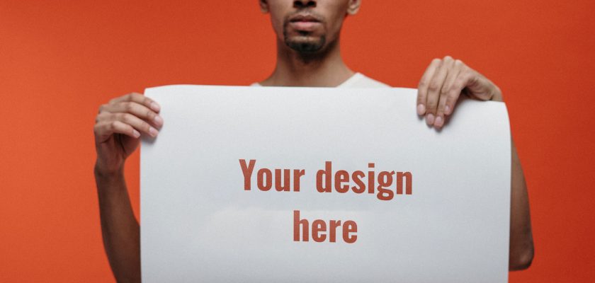 Man Holding Poster mockup