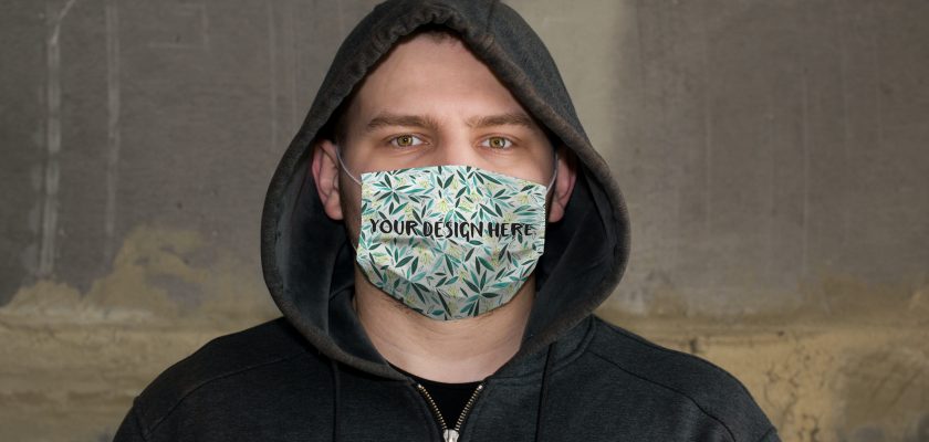 Face Mask Mockup on a Guy in a Hoodie