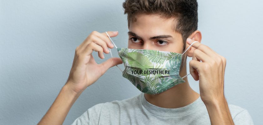 Guy Putting on a Face Mask Mockup