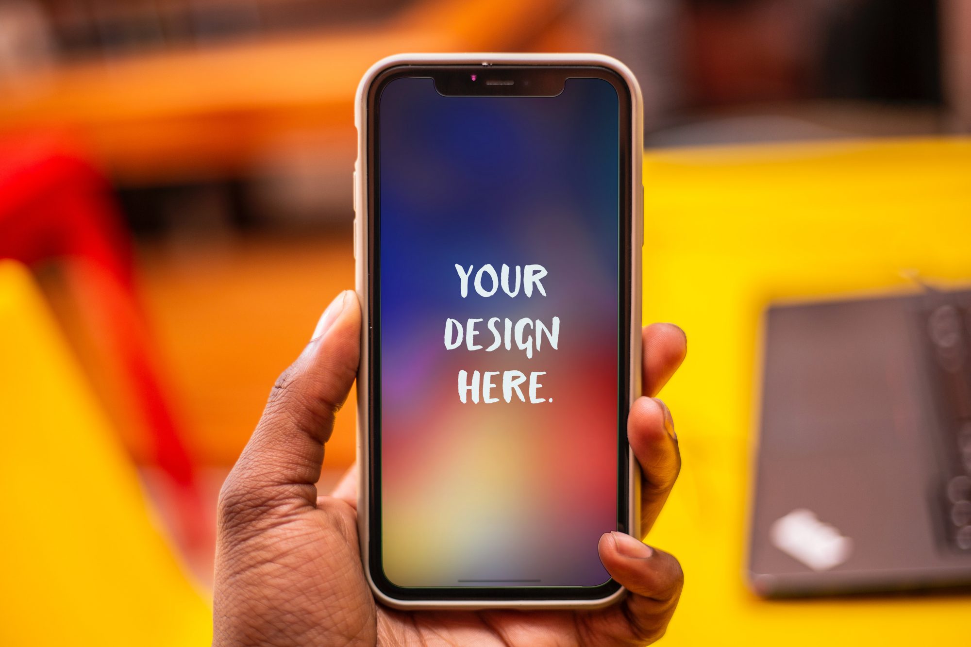 Download iPhone in a Hand - Free Mockup Download