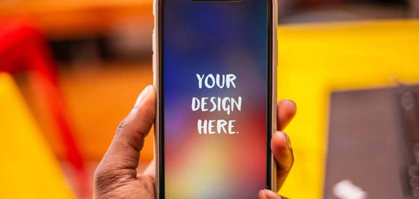 iPhone in a Hand Mockup