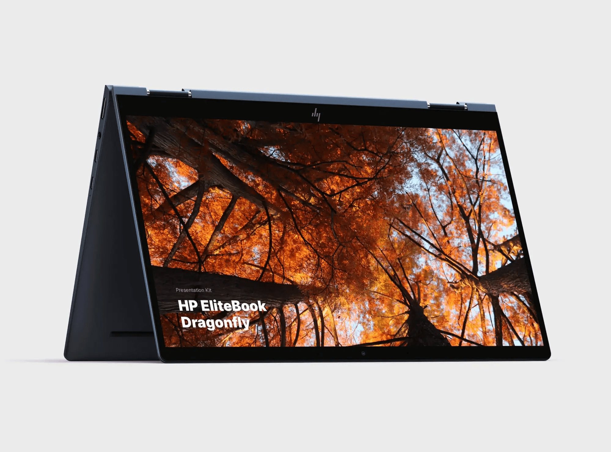 Free HP Elitebook Dragonfly Mockup showcasing a sleek laptop design in three colors, perfect for elevating your design presentations.