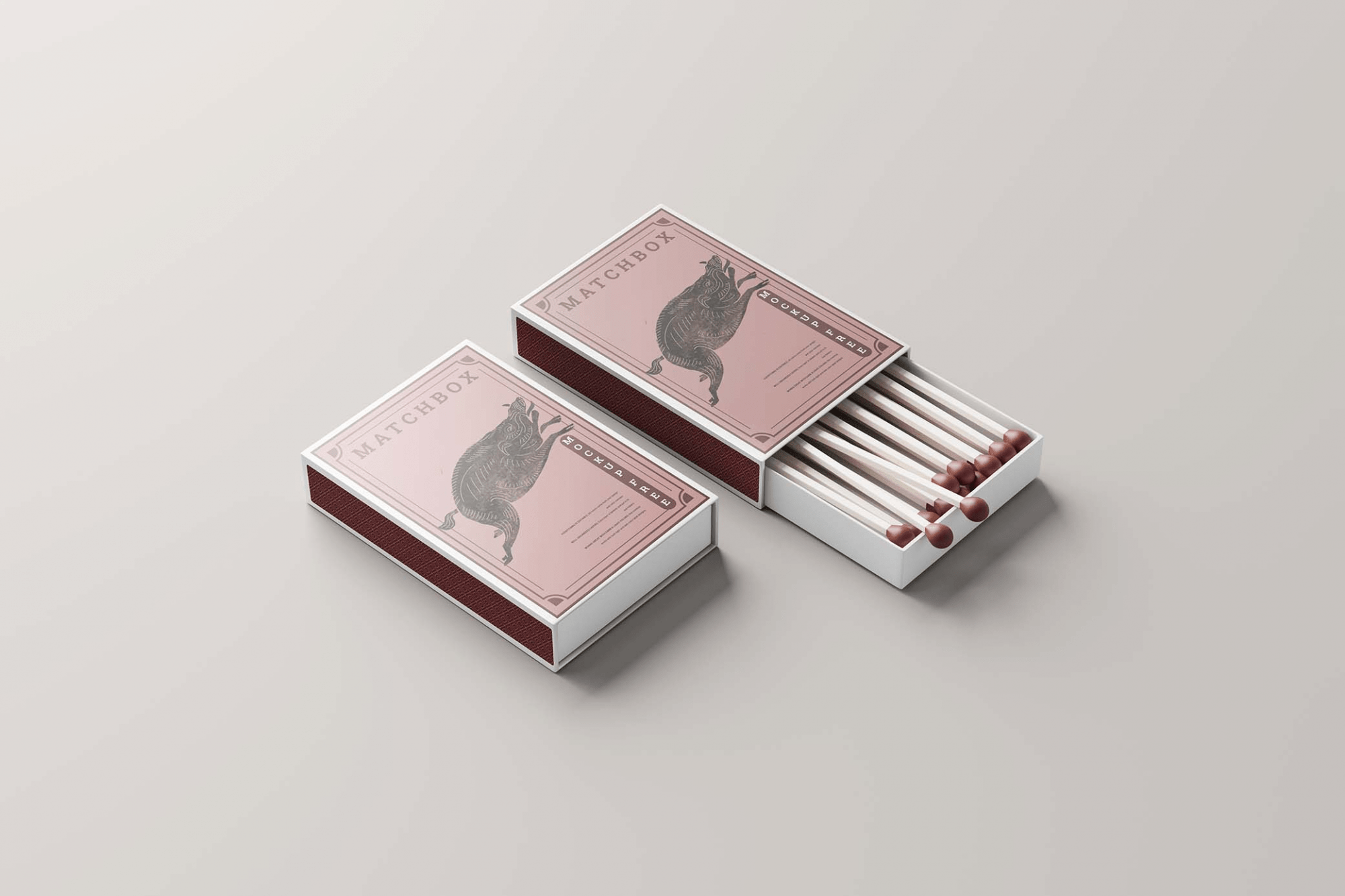 Matchbox mockup featuring two boxes side by side with customizable designs and wooden match colors