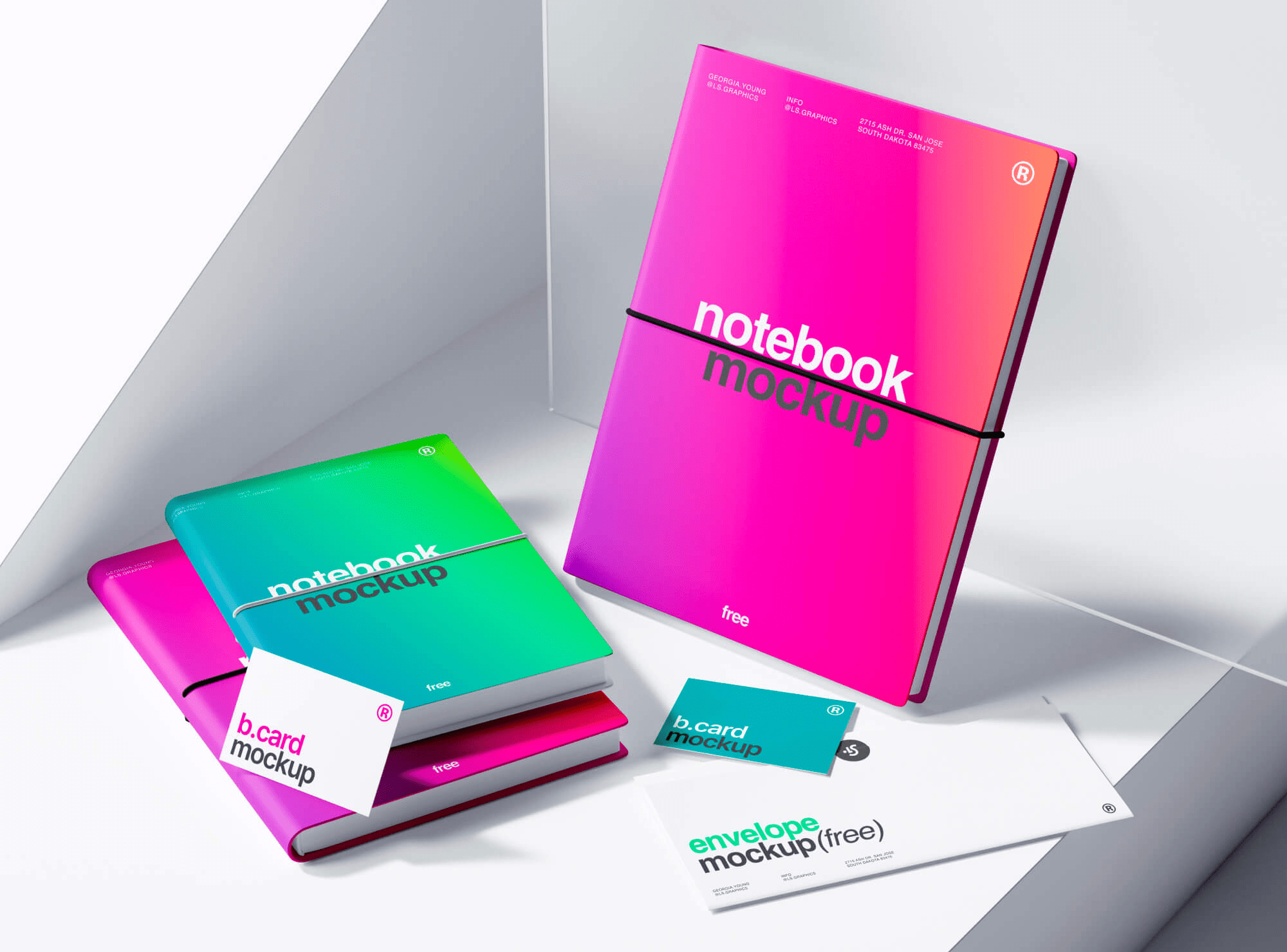 Vibrant mockup of notebooks in green and pink hues, business cards, and a white envelope, displayed in a sleek environment.