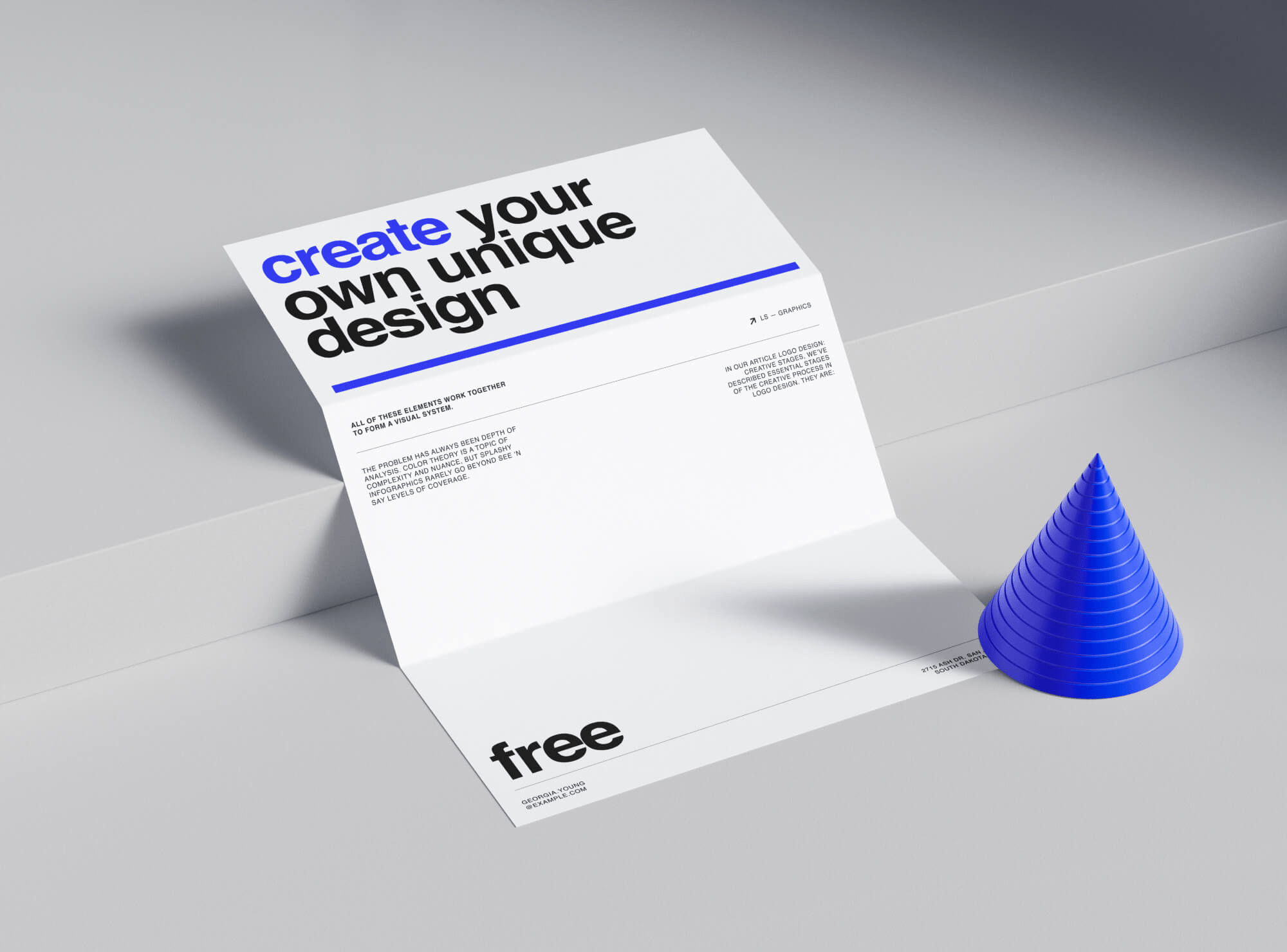 Blue Geometric Folded Paper Beside Free Realistic Folded Paper Mockup for Artistic Display