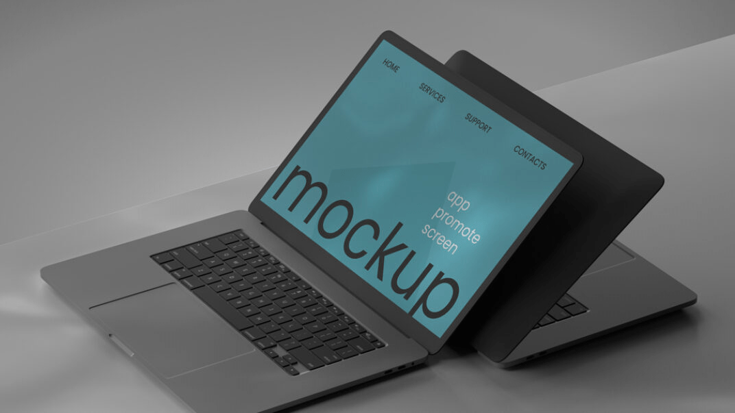A MacBook with a teal screen displaying the text "mockup" angled on a grey background, depicting a professional mockup setting.
