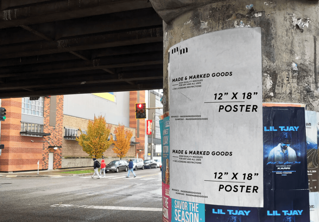 Free PSD mockup of a 12" x 18" poster glued to a concrete pillar under an overpass, showcasing urban style.