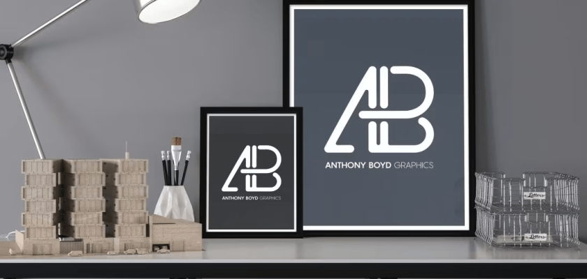Free Desk Mockup with Posters and Lamp