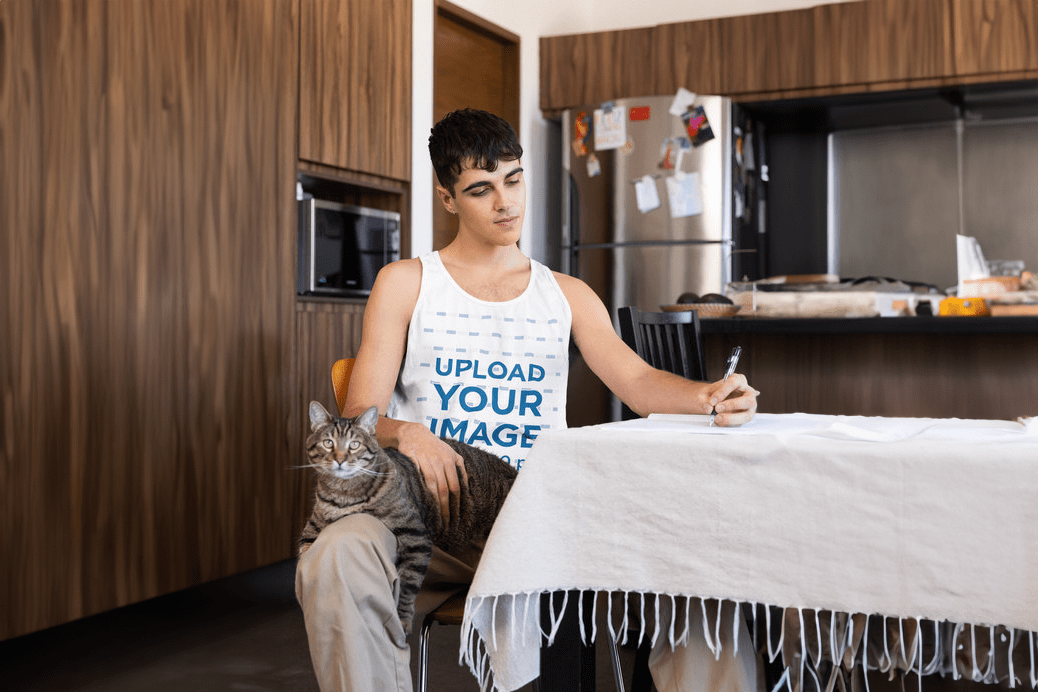 A photorealistic mockup of a man wearing a Bella Canvas tank top with a cat on his lap, perfect for showcasing pet-themed designs.