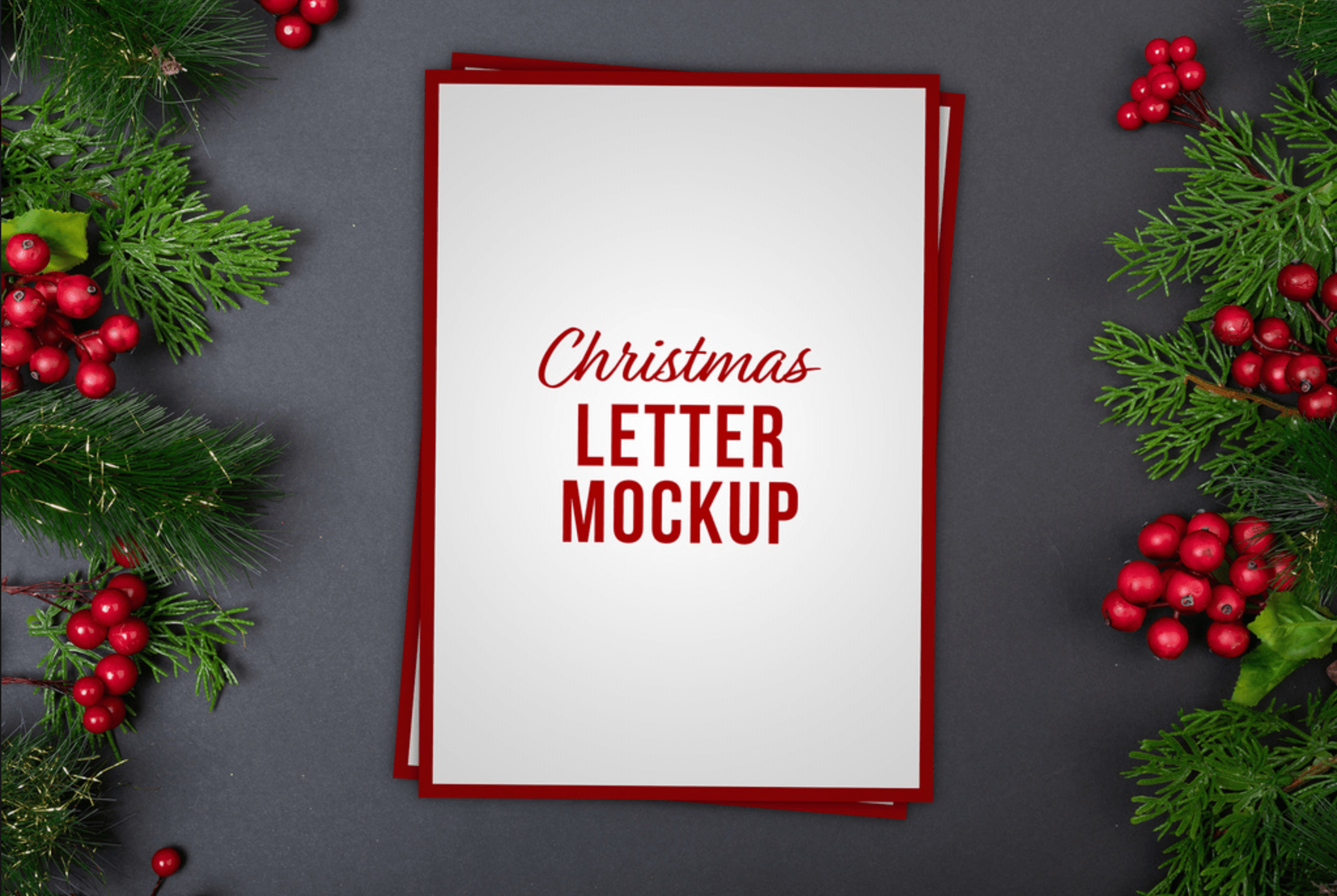 Free Christmas mockup PSD &mdash; Christmas letter on paper sheets with greenery and red berries