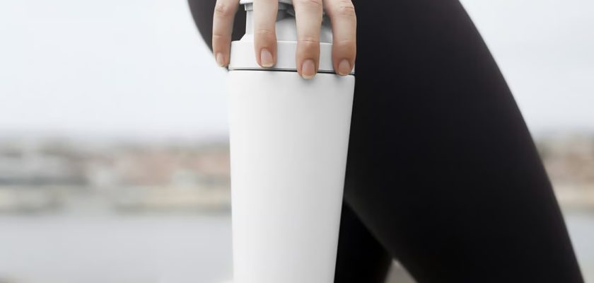 Thermos Mug Mockup &mdash; Photorealistic Hand-Held PSD