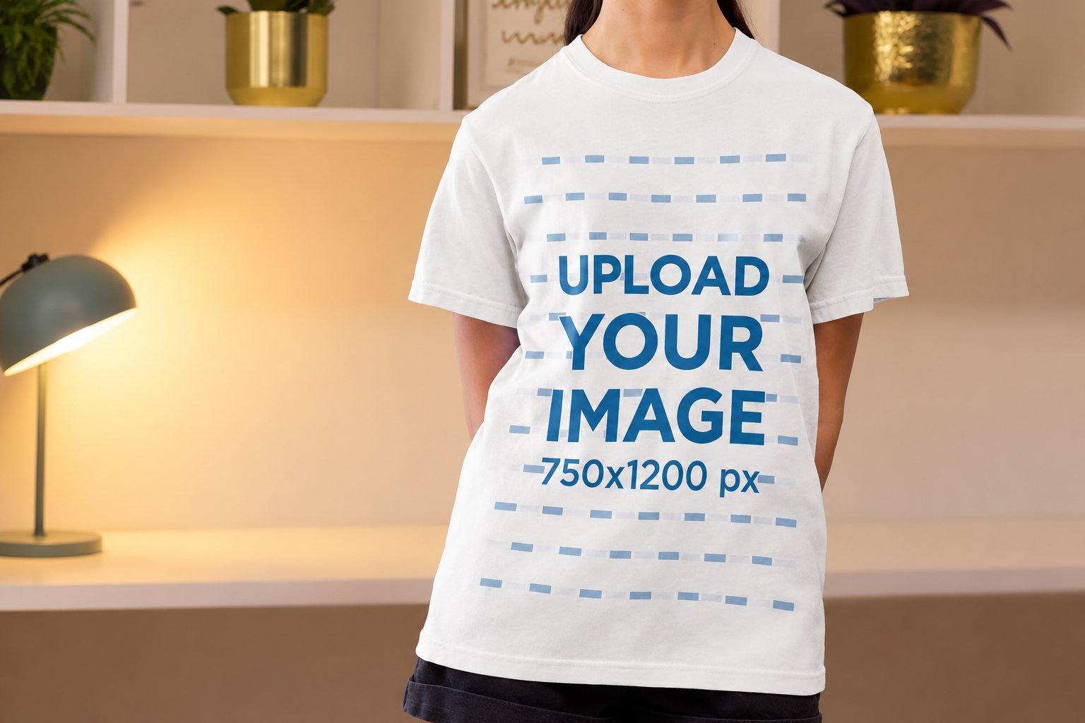 Free t-shirt video mockup of a woman in a Comfort Colors tee in a cozy room