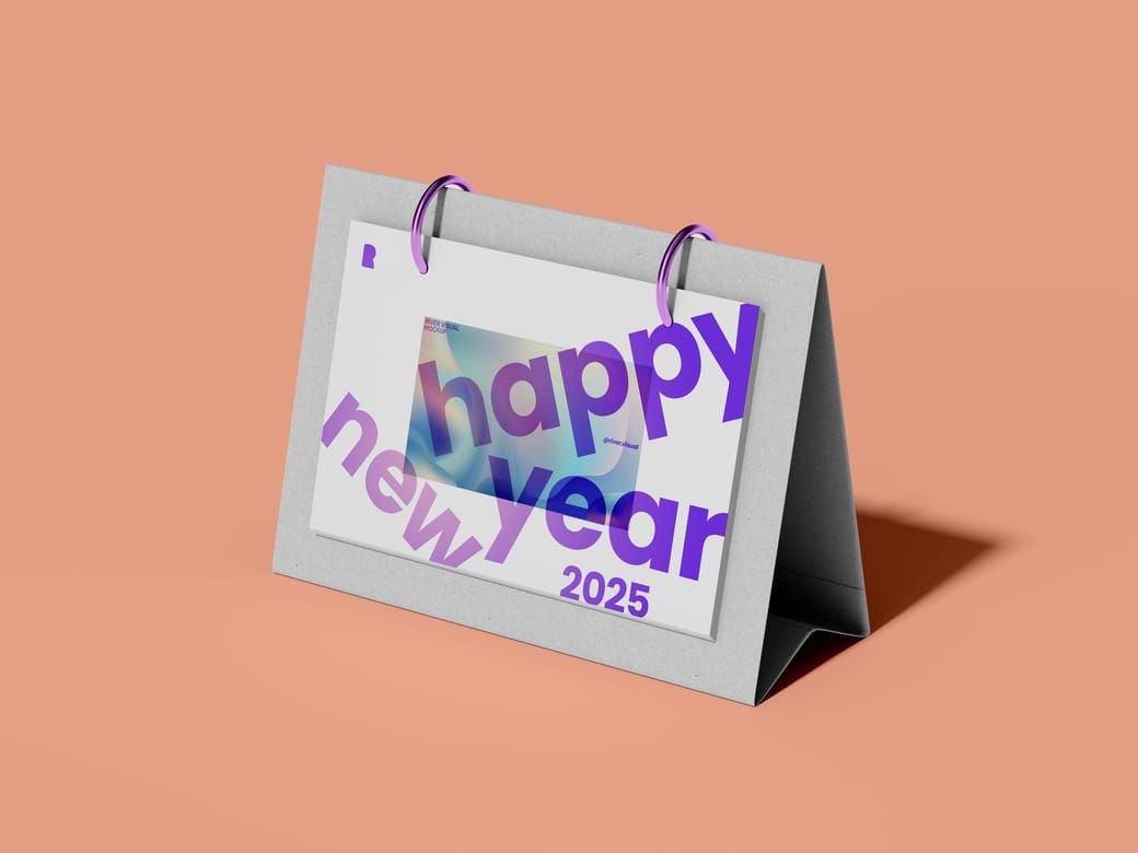 Free calendar mockup PSD — tent desk calendar with rings on a peach background