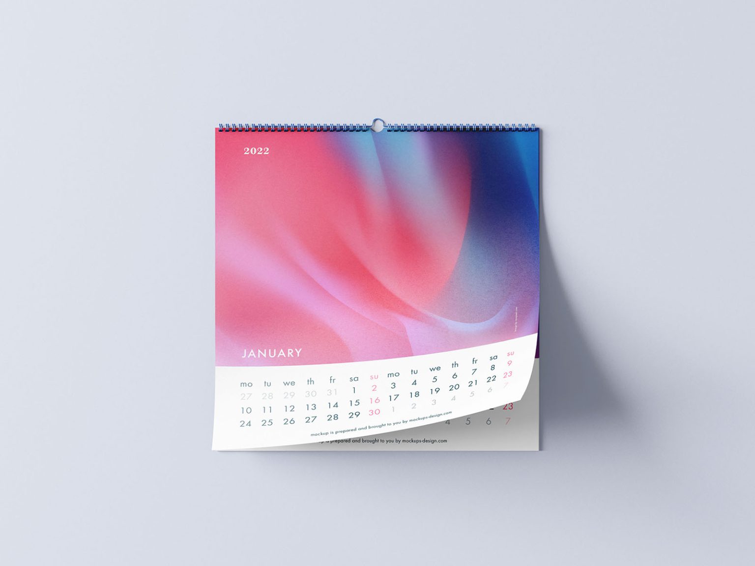 Free calendar mockup PSD — square wall calendar with a curled page